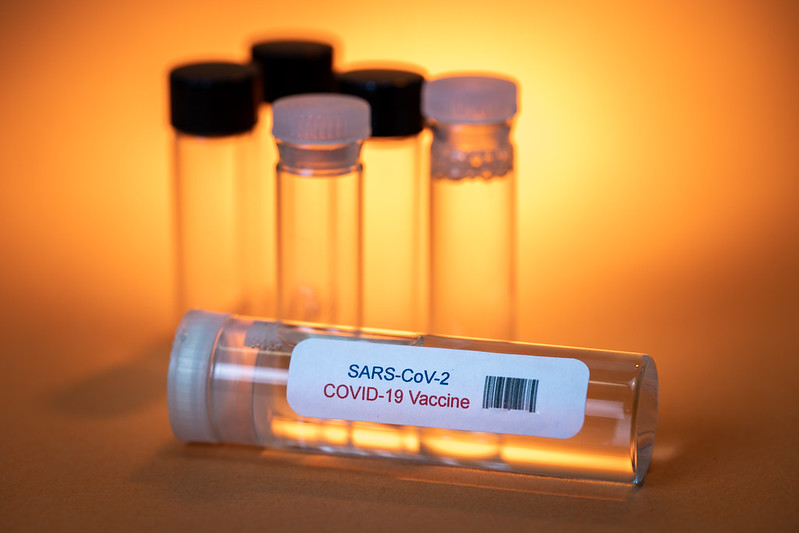 Glass bottle with Sars-Covid-19 vaccine label attached. Free image from https://foter.com/